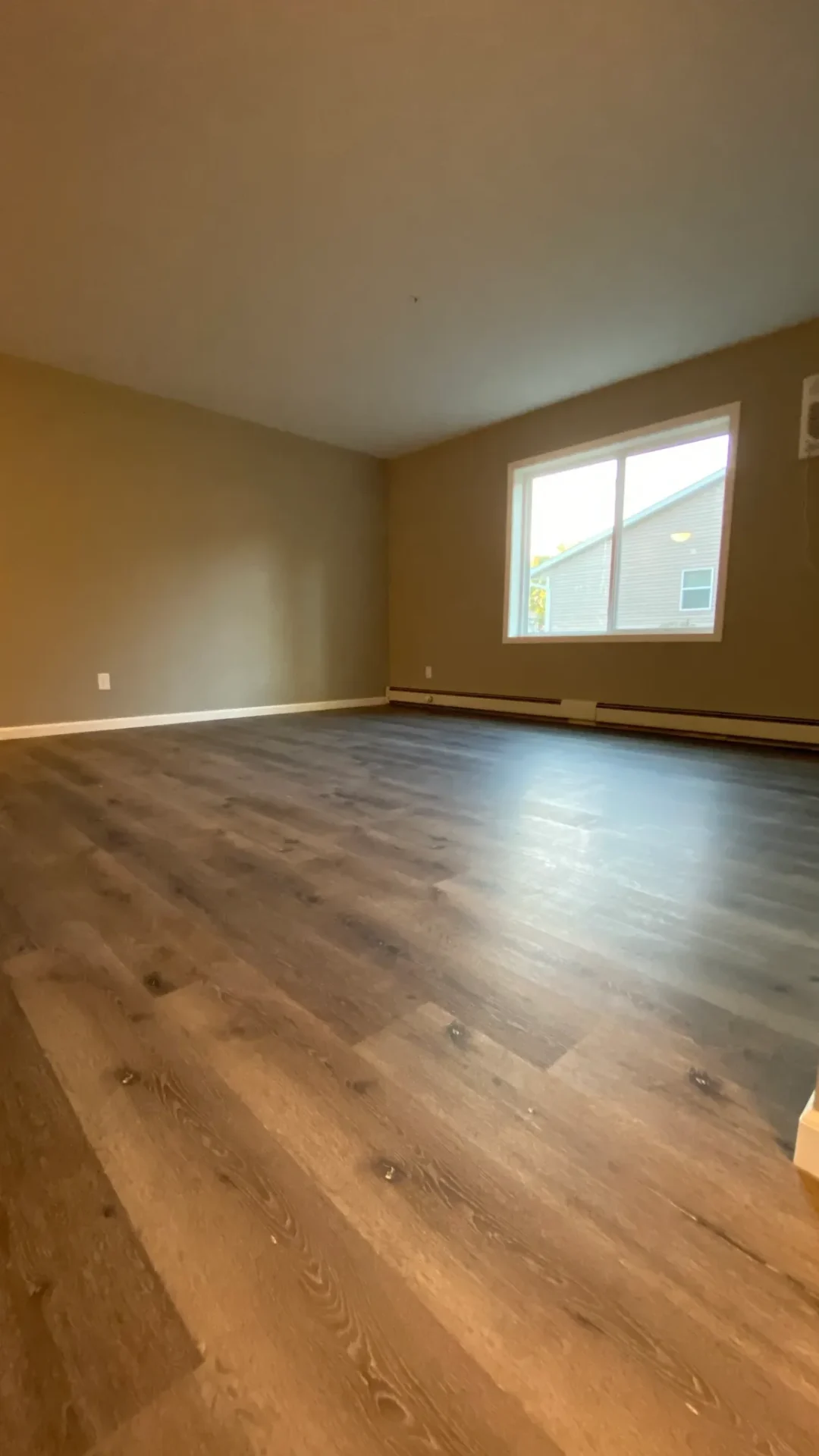 Empty room with wooden floor