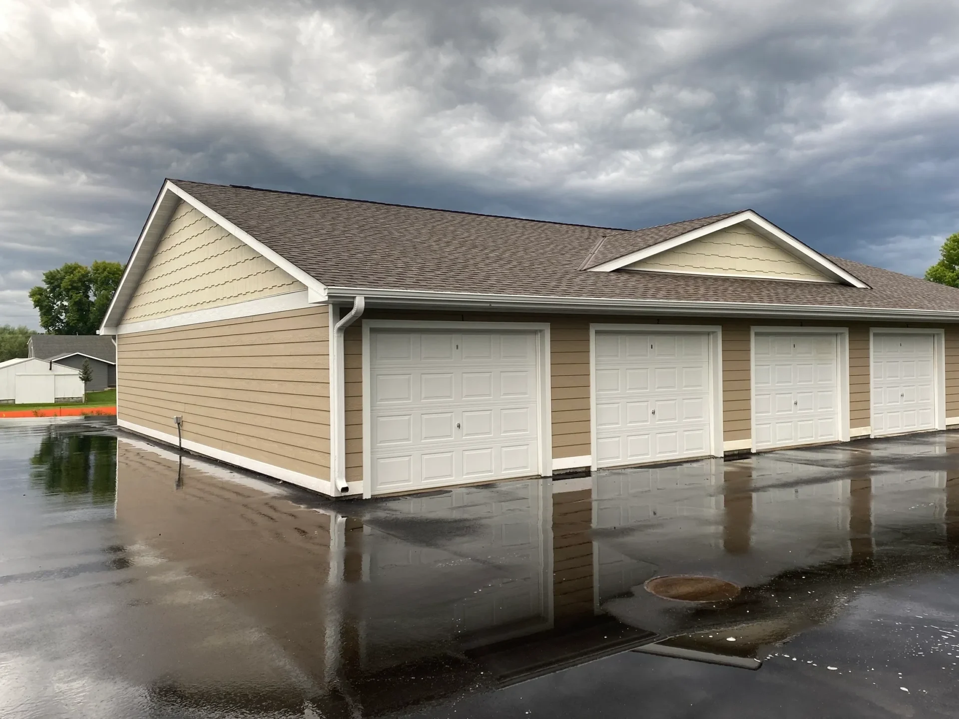 Tan garage with white doors